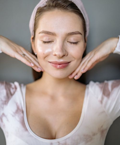 Portrait photo of Olga Zarichna, the yoga instructor, smiling warmly.